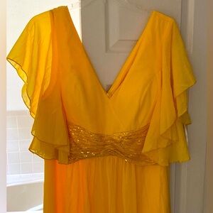 Party dress very nice not used beautiful yellow awesome design